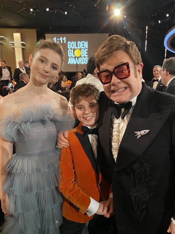 Elton John poses with Roman Griffin Davis