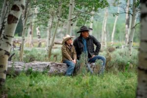 (L-R) Brecken Merrill as Tate Dutton and Kevin Costner as John Dutton