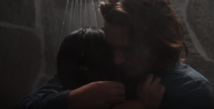 Kacy wraps Monica in his arm while she showring in yellowstone season 3 episode 8
