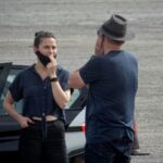 Hayley who dressed in a blue shirt and black jeans stood with Mission-Impossible 7 director Christopher