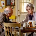 Dr. Sturgis (Wallace Shawn) and Meemaw (Annie Potts). in Young Sheldon Season 4 Episode 17 Photos