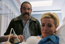 Queen of the South Season 5 Episode 7 Photos of “El Zorro en La Gallinera” Kelly Anne & Pote at the hospital for pregnancy test in Queen of the South Season 5 Episode 7 -Photos
