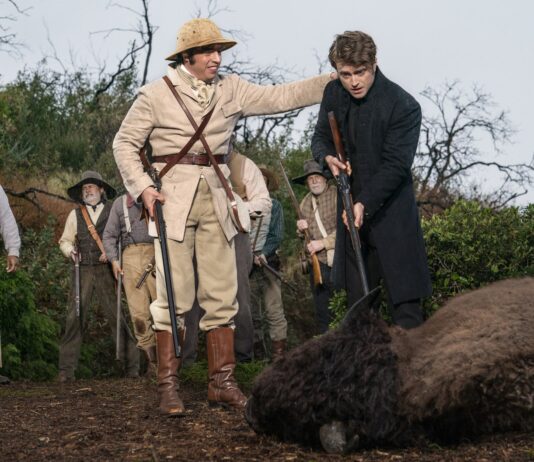Miracle Workers Season 3 Episode 3: Release Date & Photos of “Hunting Party” Miracle Workers Season 3 Episode 3 Jon Bass - Daniel Radcliffe-min