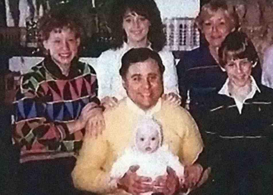 John Robison holding baby Tiffany Stasi- 